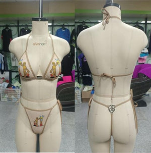 Mannequin displaying a bikini set with colorful designs on a store shelf background